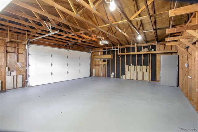 garage featuring freestanding refrigerator