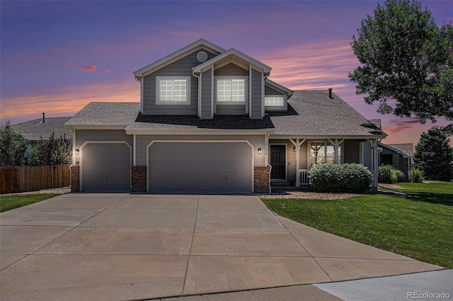 17174 E Rosebay Cir, Parker, CO 80134 - view of front of property with driveway, brick siding, a shingled roof, and a garage