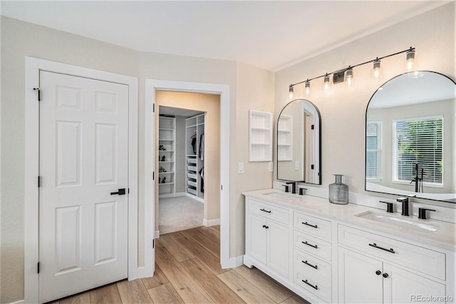 17174 E Rosebay Cir, Parker, CO 80134 - full bath featuring double vanity, wood finished floors, and a spacious closet