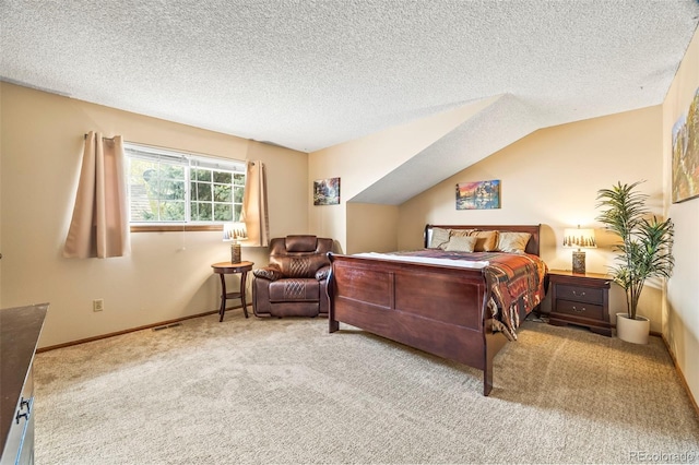 carpeted bedroom featuring a textured ceiling, visible vents, baseboards, and vaulted ceiling