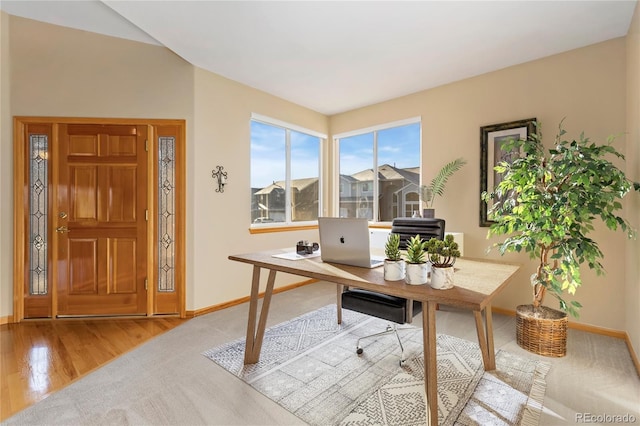 office featuring baseboards and wood finished floors