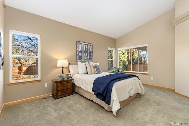 bedroom featuring light carpet, visible vents, baseboards, and vaulted ceiling