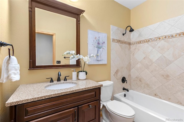 full bath featuring shower / washtub combination, toilet, and vanity