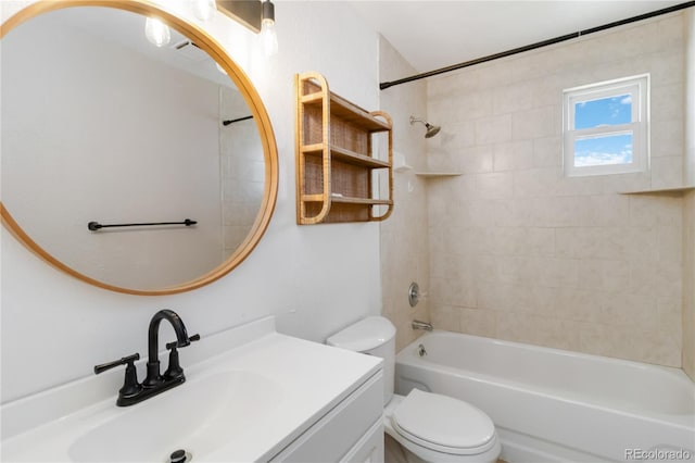 full bath featuring toilet, vanity, and  shower combination