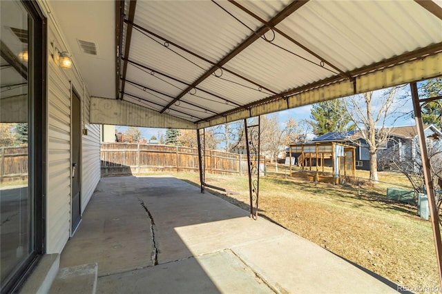 view of patio / terrace featuring a fenced backyard and visible vents