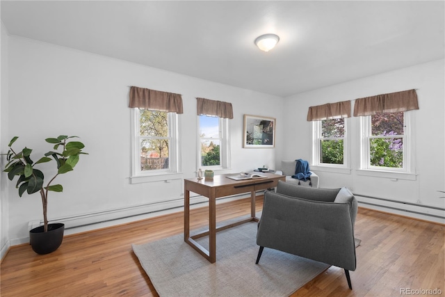 2020 Routt St, Lakewood, CO 80215 - office space with baseboard heating, light wood-style flooring, and baseboards