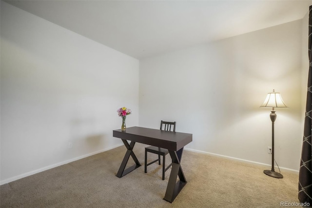 office with carpet flooring and baseboards