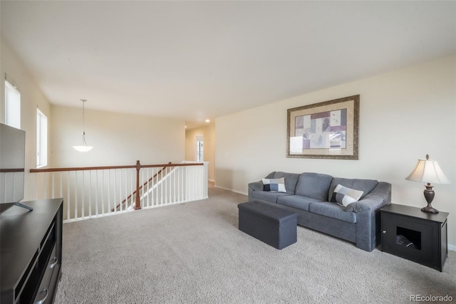 living area with carpet