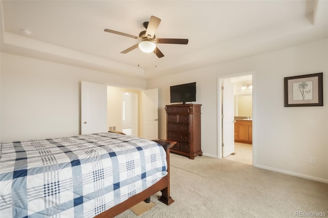 bedroom featuring light colored carpet, baseboards, and ceiling fan