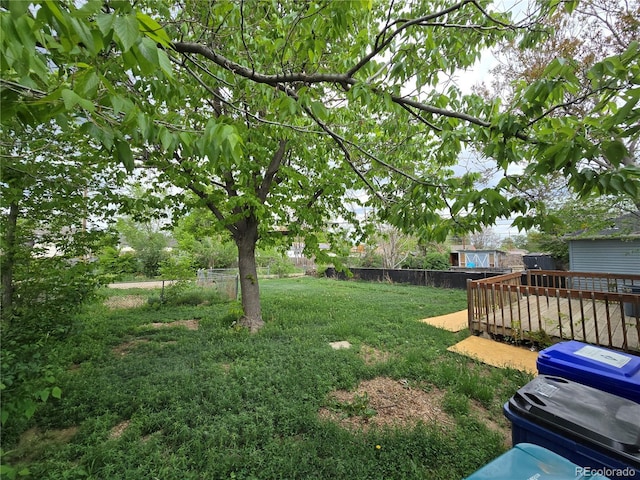 1717 Oswego St, Aurora, CO 80010 - view of yard with a wooden deck