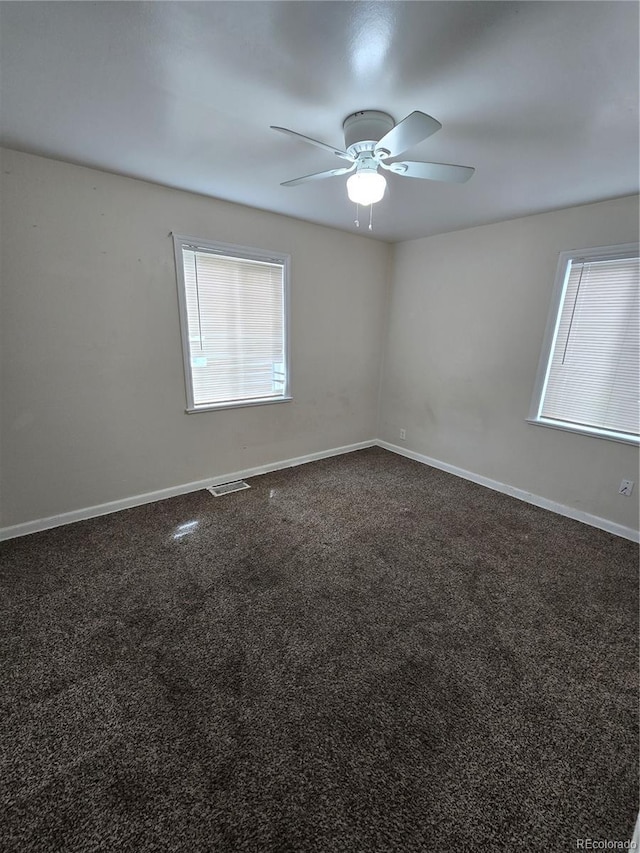 1717 Oswego St, Aurora, CO 80010 - empty room with plenty of natural light, a ceiling fan, and baseboards
