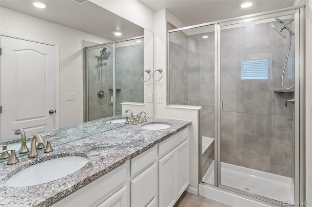315 Zeppelin Way, Fort Collins, CO 80524 - full bathroom with a stall shower, double vanity, and recessed lighting