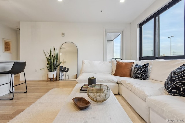 living area with light wood-style floors