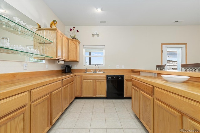 kitchen with sink, a healthy amount of sunlight, dishwasher, and butcher block counters