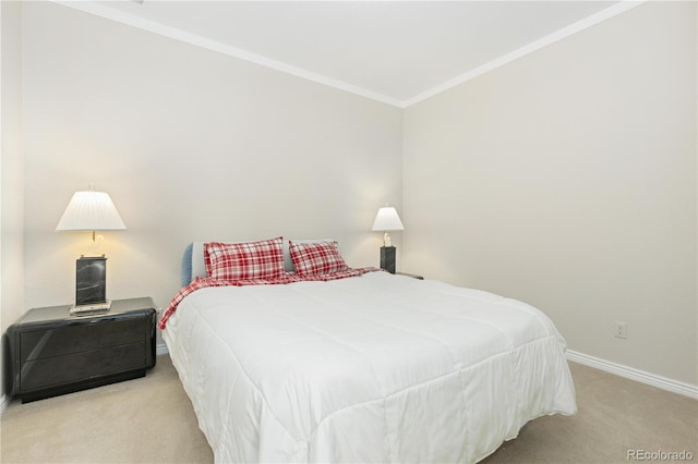 carpeted bedroom featuring ornamental molding