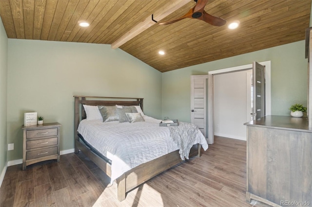 bedroom featuring baseboards, wood ceiling, lofted ceiling with beams, and dark wood finished floors