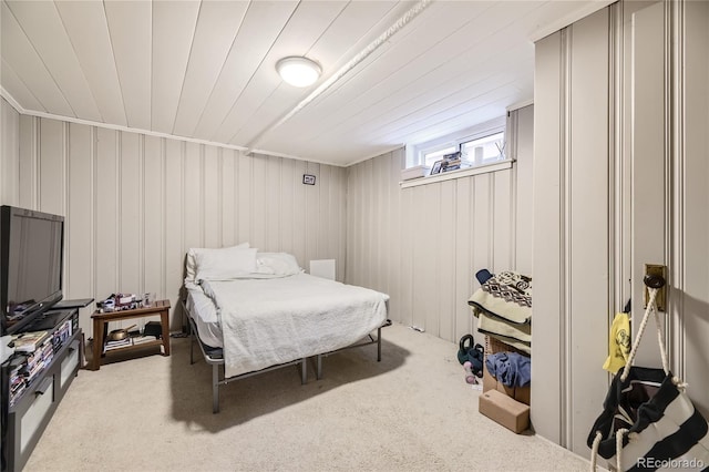 bedroom featuring light colored carpet