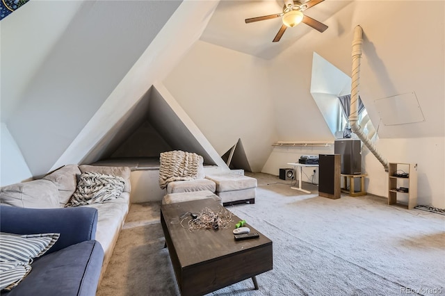 living room with ceiling fan, carpet floors, and vaulted ceiling