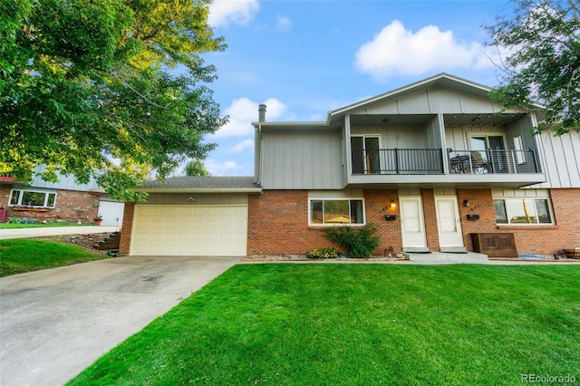 view of front of house featuring a balcony, a garage, and a front lawn