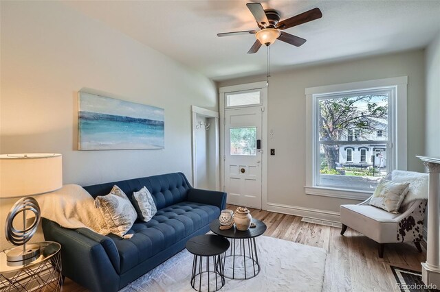 2564 N Emerson St, Denver, CO 80205 - living room with wood finished floors, a ceiling fan, and baseboards