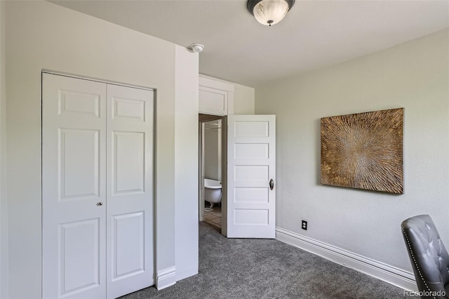 2564 N Emerson St, Denver, CO 80205 - unfurnished bedroom featuring dark colored carpet, baseboards, and a closet