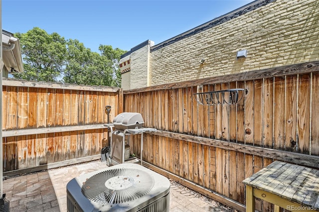 2564 N Emerson St, Denver, CO 80205 - view of patio / terrace with area for grilling, central AC, and fence