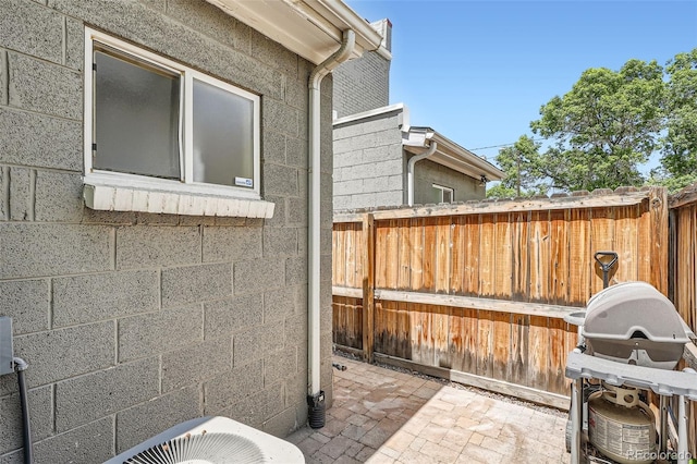 2564 N Emerson St, Denver, CO 80205 - view of patio with fence and a grill