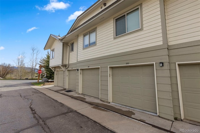 1501 Point Dr Unit 202, Frisco, CO 80443 - view of side of home with an attached garage
