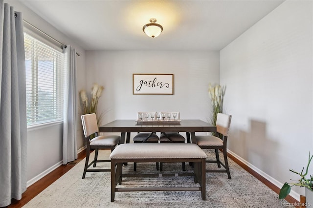 76 N Ider St, Aurora, CO 80018 - dining area with wood finished floors and baseboards