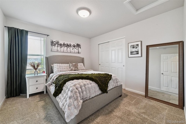 76 N Ider St, Aurora, CO 80018 - carpeted bedroom featuring attic access and a closet