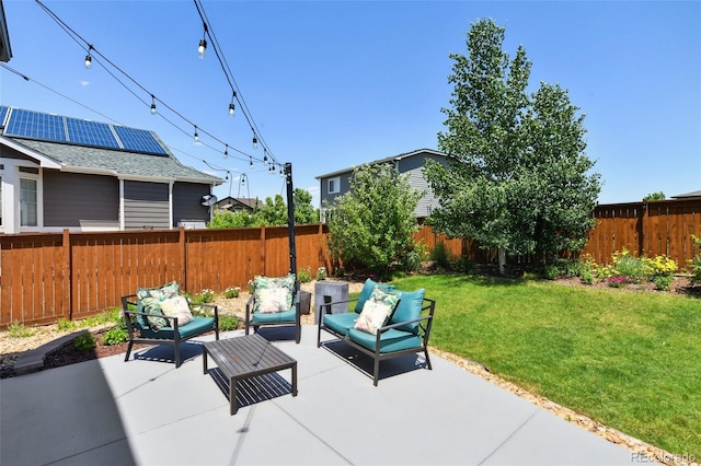 76 N Ider St, Aurora, CO 80018 - fenced backyard with a patio and outdoor lounge area