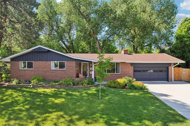 13140 W 15th Dr, Golden, CO 80401 - ranch-style home featuring an attached garage, brick siding, concrete driveway, and a chimney