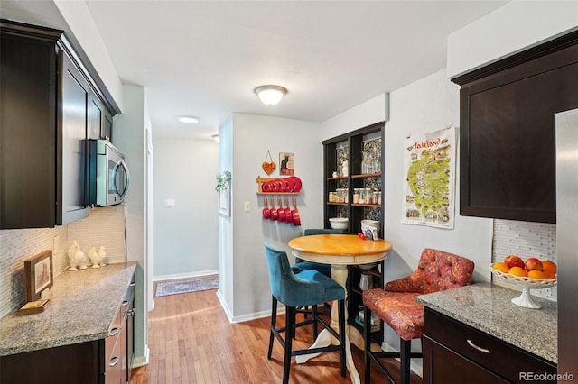 13140 W 15th Dr, Golden, CO 80401 - dining space featuring light wood finished floors and baseboards