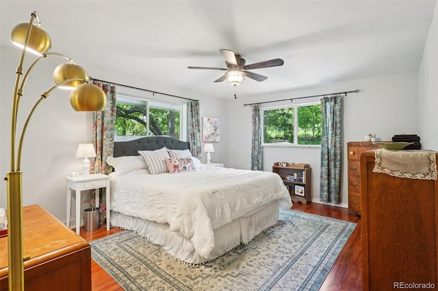 13140 W 15th Dr, Golden, CO 80401 - bedroom with wood finished floors and ceiling fan