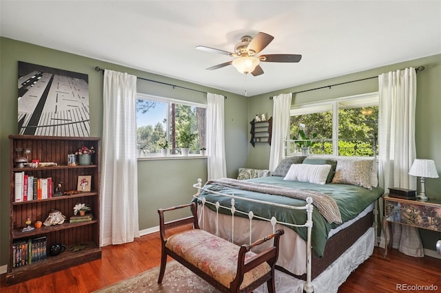 13140 W 15th Dr, Golden, CO 80401 - bedroom featuring wood finished floors and ceiling fan