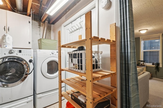 13140 W 15th Dr, Golden, CO 80401 - laundry room with independent washer and dryer, cabinet space, and carpet floors