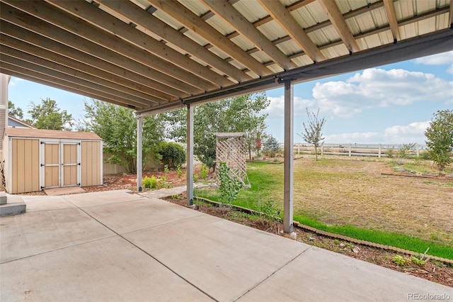 view of patio with a shed