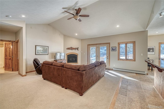 living room with a baseboard heating unit, a textured ceiling, lofted ceiling, and ceiling fan