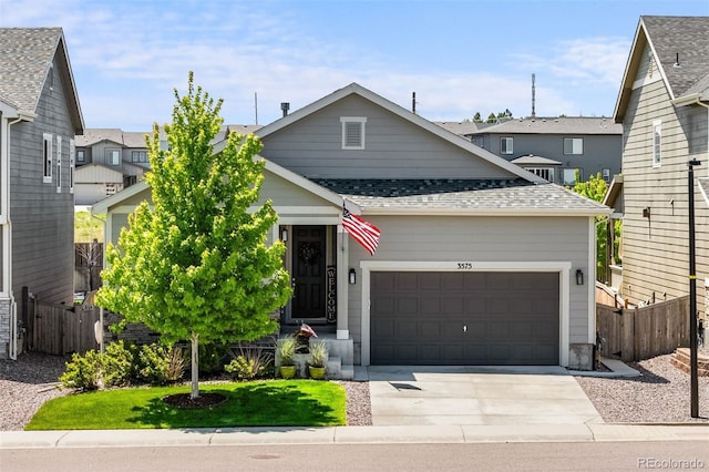 3575 White Rose Loop, Castle Rock, CO 80108 - view of front of property with a garage, concrete driveway, a shingled roof, and a residential view