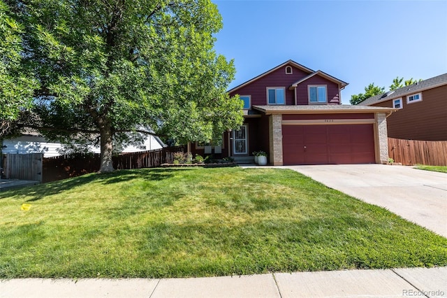 5630 W 115th Ave, Westminster, CO 80020 - view of front of home with driveway and brick siding