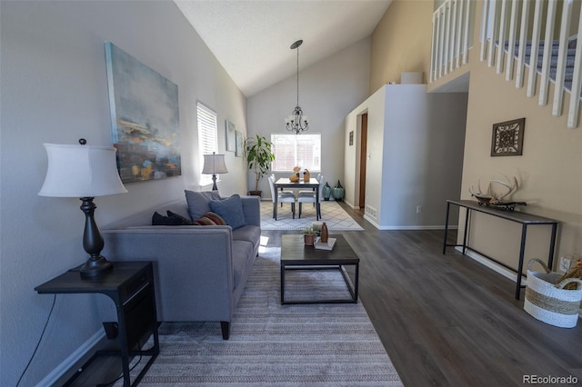 5630 W 115th Ave, Westminster, CO 80020 - living area with a chandelier, wood finished floors, and high vaulted ceiling