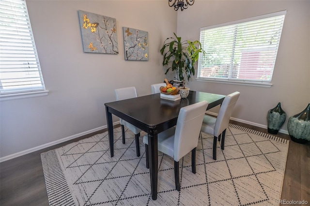 5630 W 115th Ave, Westminster, CO 80020 - dining room featuring baseboards and wood finished floors