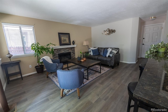 5630 W 115th Ave, Westminster, CO 80020 - living room featuring wood finished floors and a fireplace