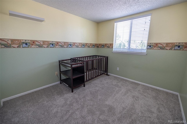 5630 W 115th Ave, Westminster, CO 80020 - bedroom with a textured ceiling and carpet
