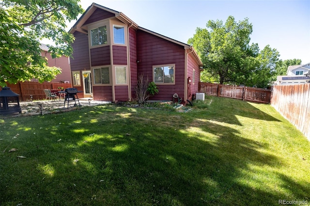 5630 W 115th Ave, Westminster, CO 80020 - back of property featuring a fenced backyard and a patio area
