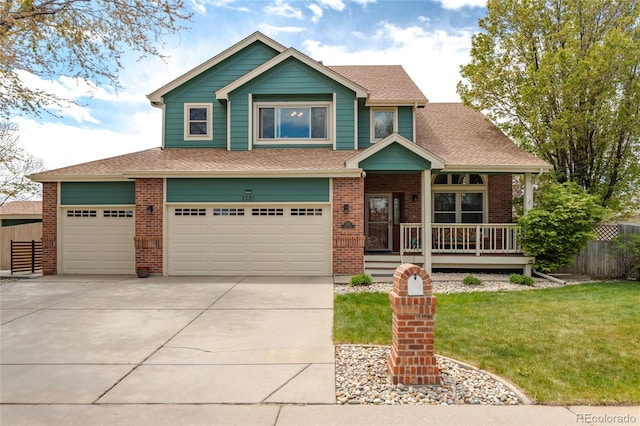craftsman house with fence, roof with shingles, a porch, a front yard, and driveway