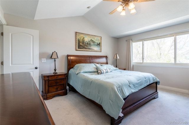 bedroom featuring baseboards, a ceiling fan, vaulted ceiling, and light colored carpet