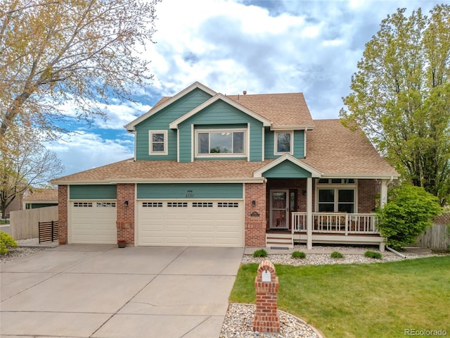 craftsman inspired home featuring a front lawn, fence, covered porch, brick siding, and concrete driveway