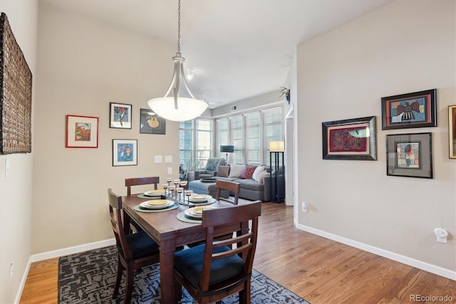 dining area featuring hardwood / wood-style flooring