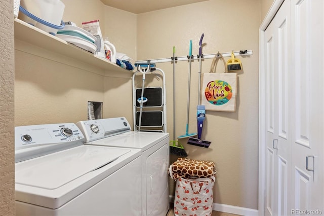 laundry area featuring independent washer and dryer